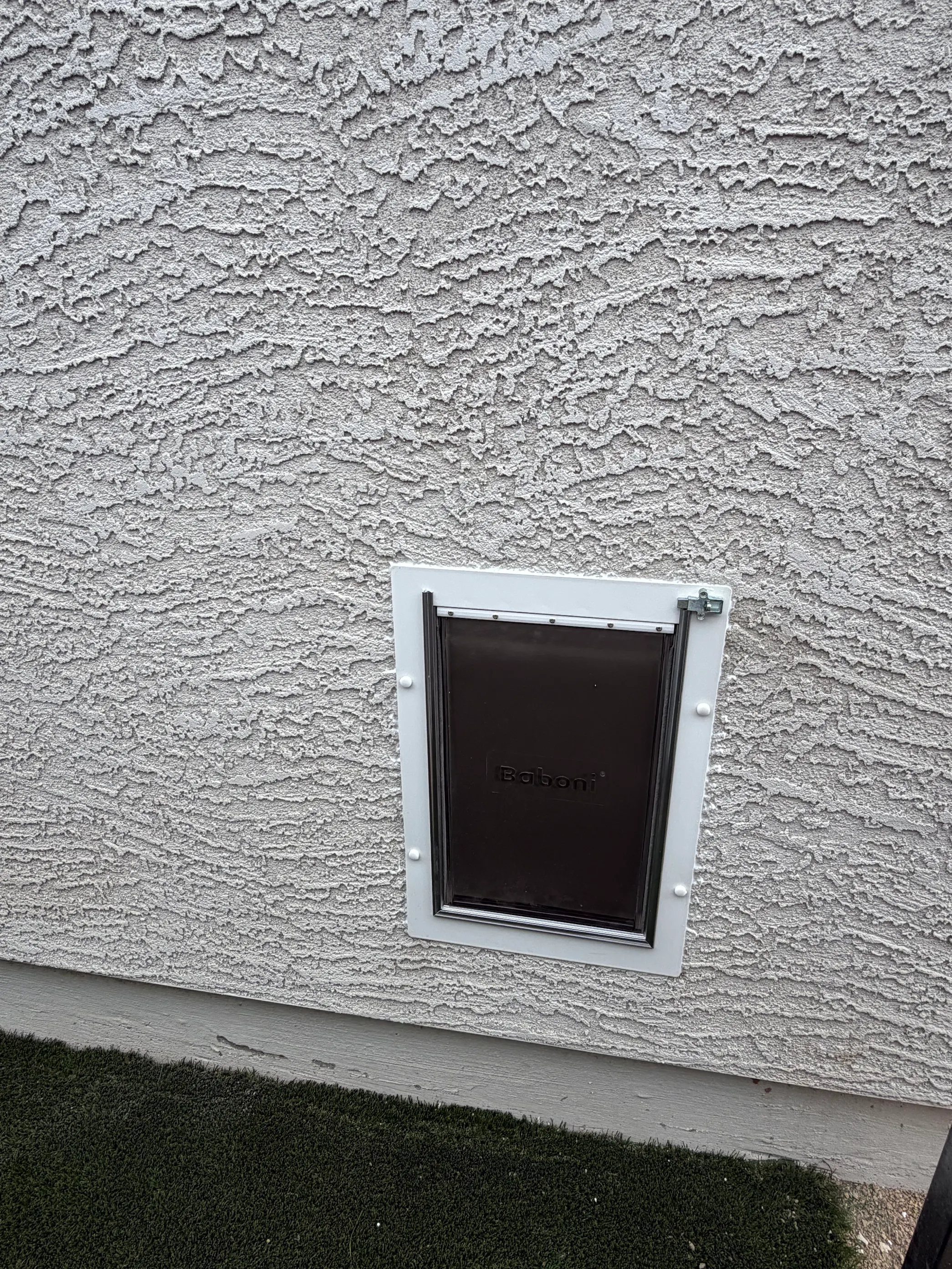 Completed Apollo pet door installation in a customer home, project 11