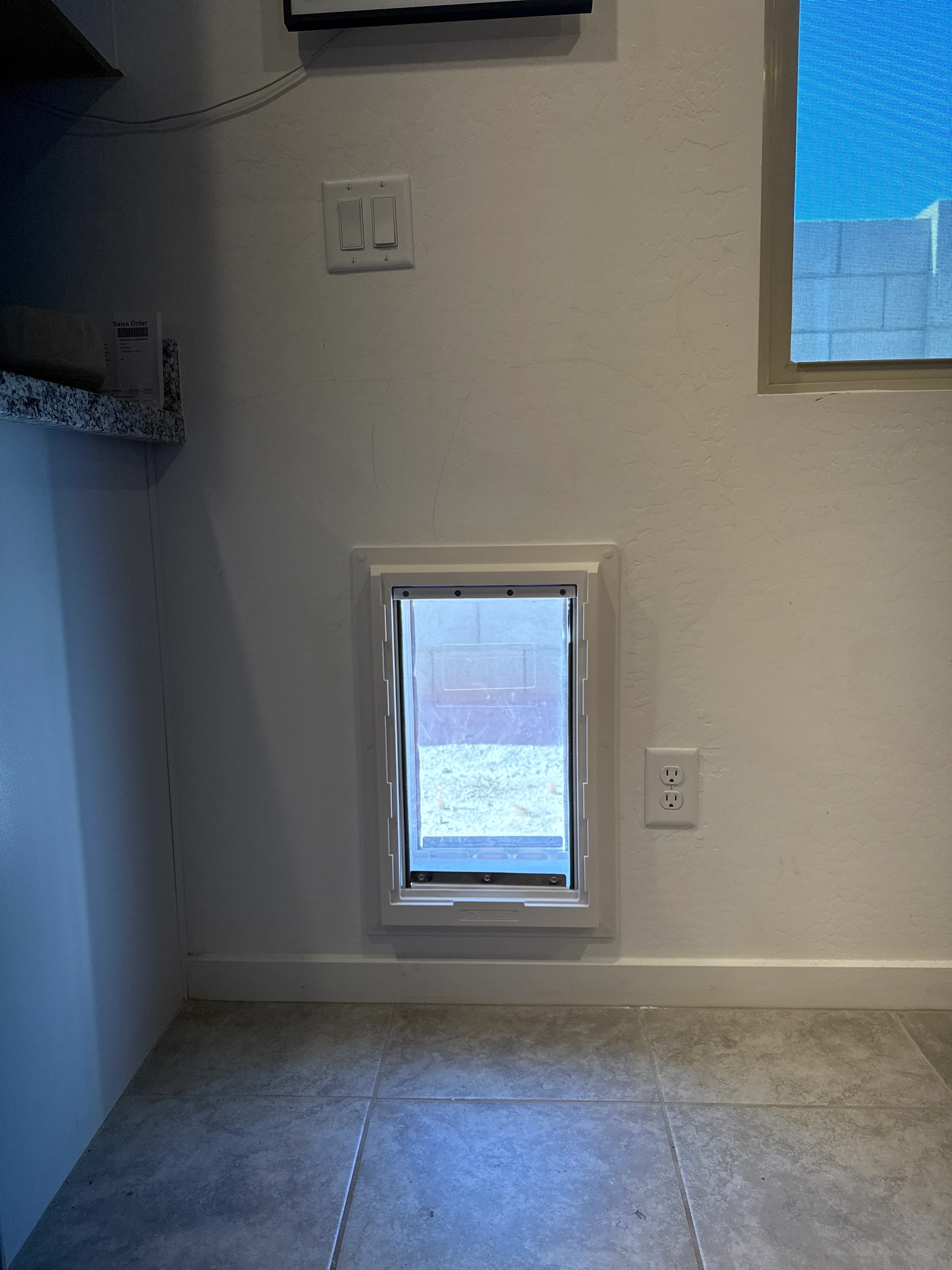 Completed Apollo pet door installation in a customer home, project 25